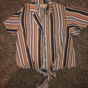 Button-down, collared, striped shirt with tie